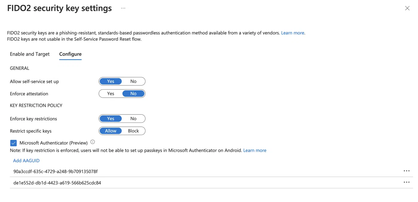 Passkey policy configuration with key restrictions enabled and supported AAGUIDs listed
